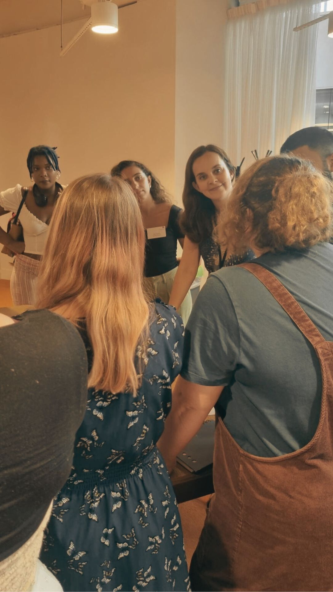 A group in discussion at Brixton Finishing School
